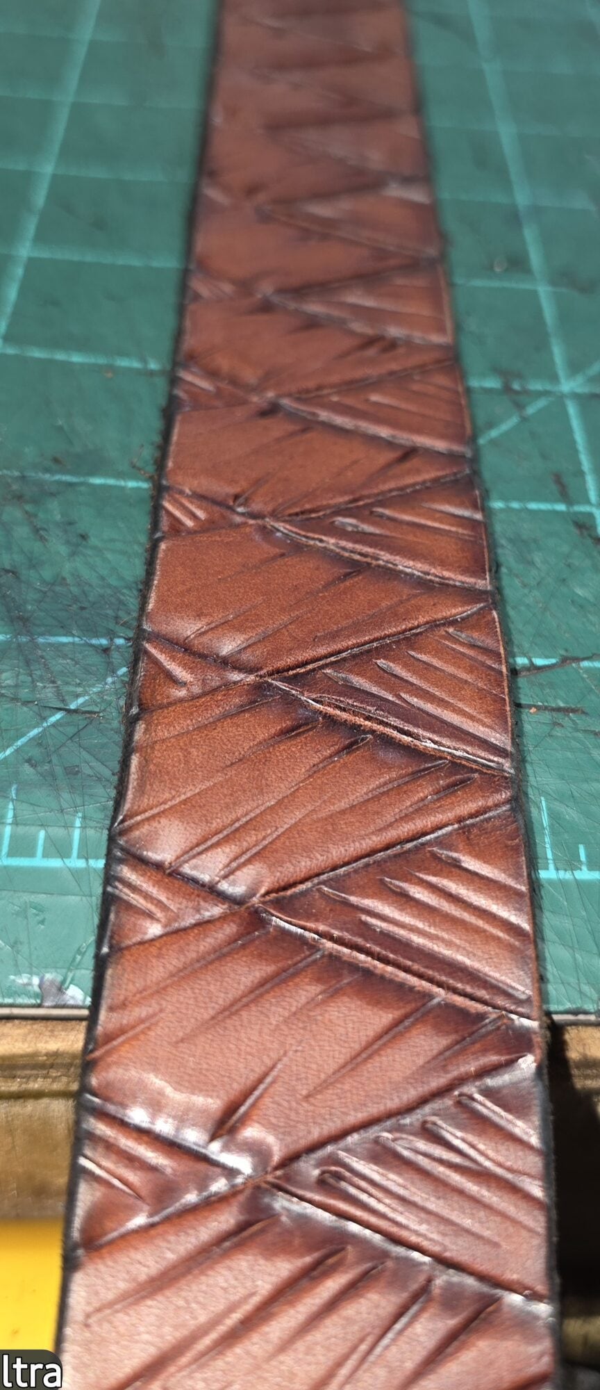 Hand tooled custom leather belt by Road Rash Leather Unlimited